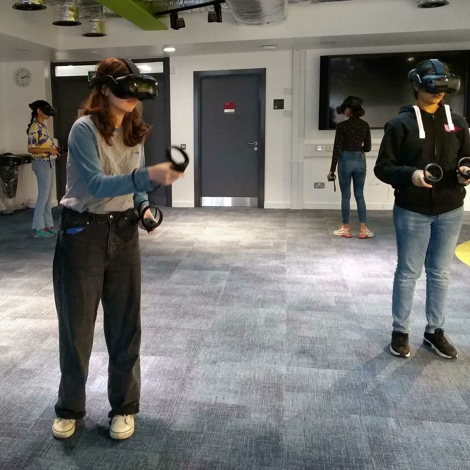 Students doing a Virtual reality (VR) cyber awareness education training at Queen's University Belfast