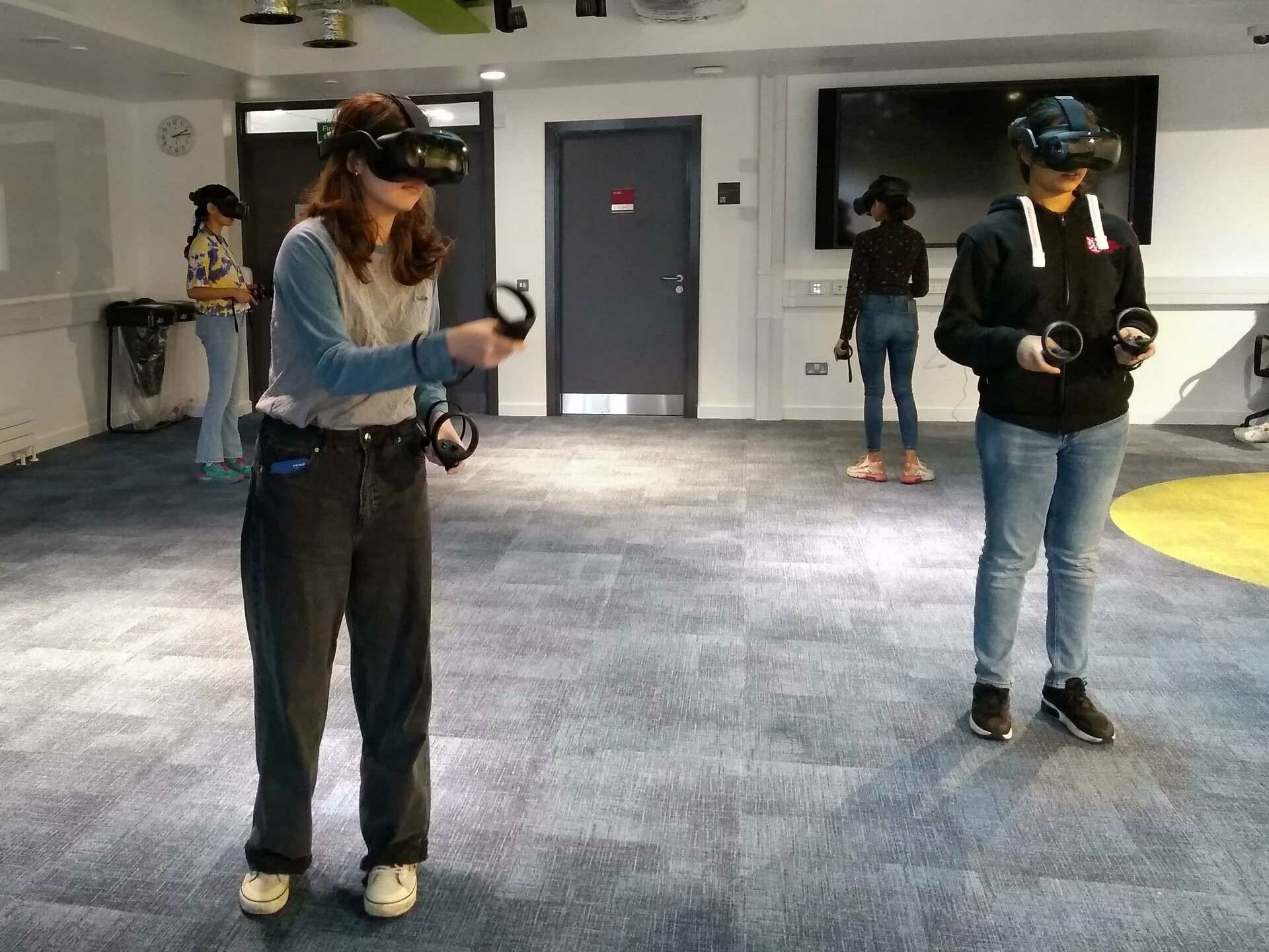 Students doing a Virtual reality (VR) cyber awareness education training at Queen's University Belfast