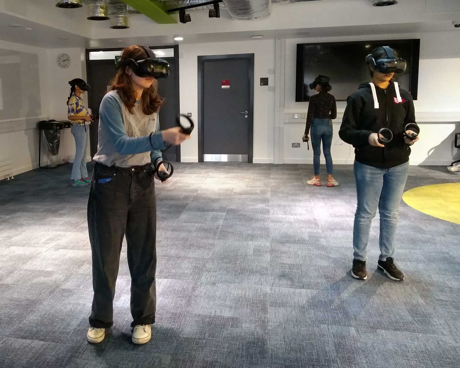 Students doing a Virtual reality (VR) cyber awareness education training at Queen's University Belfast