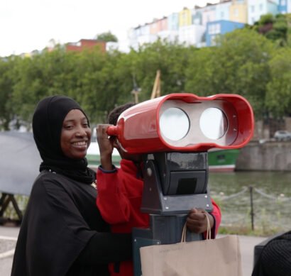 AR Binoculars. Mother and kid using VR binoculars at the SSGB.SS Great Britain celebrates 180 birthday with VR binoculars
