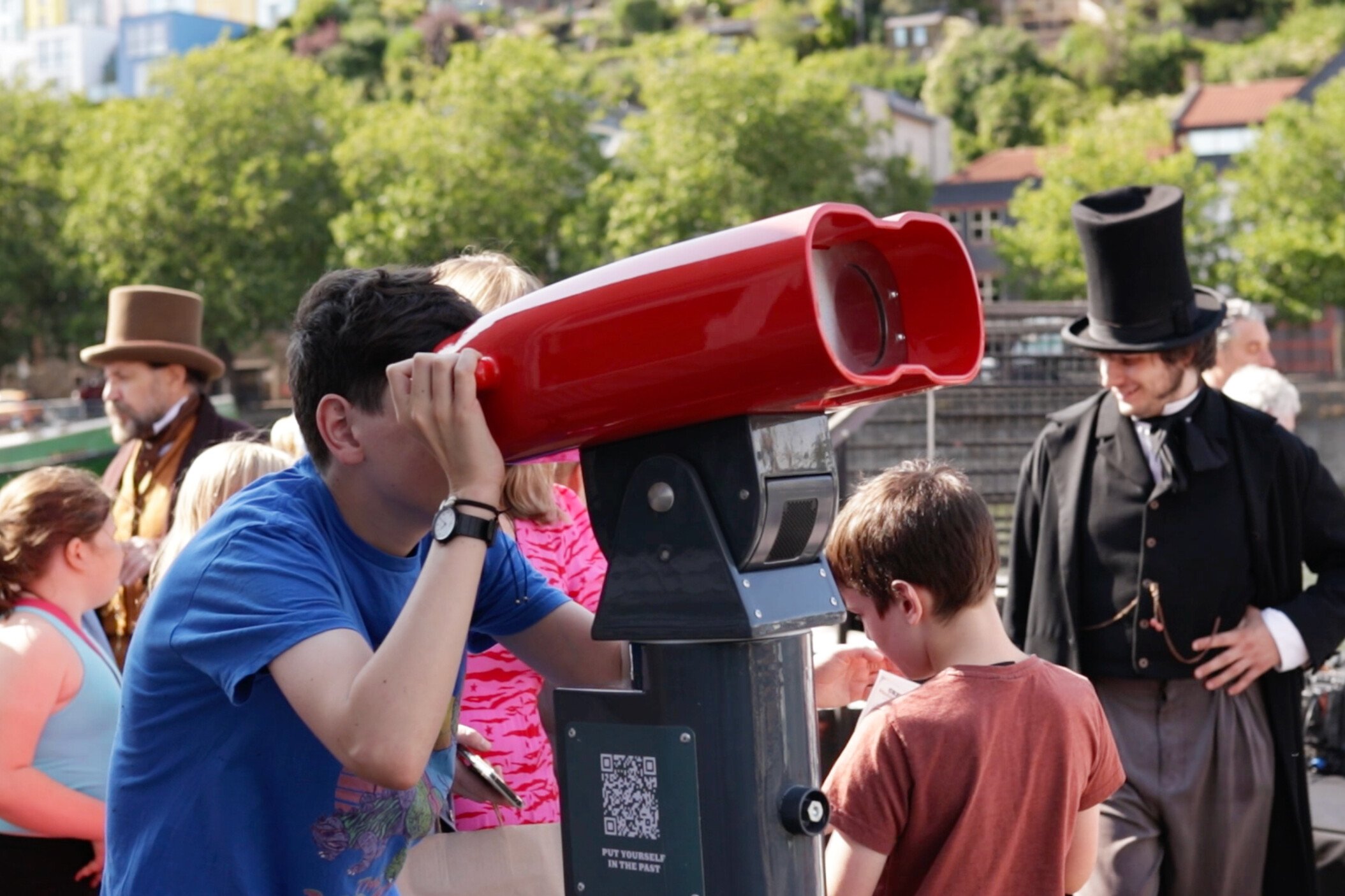 Person looking through SSGB AR binoculars