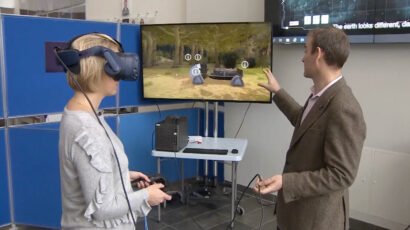 Visioning DSTL. Woman using Virtual reality headset for the Museum of the Future project