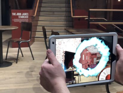 ipad with Window to the Past Augmented reality app for Bristol Old Vic