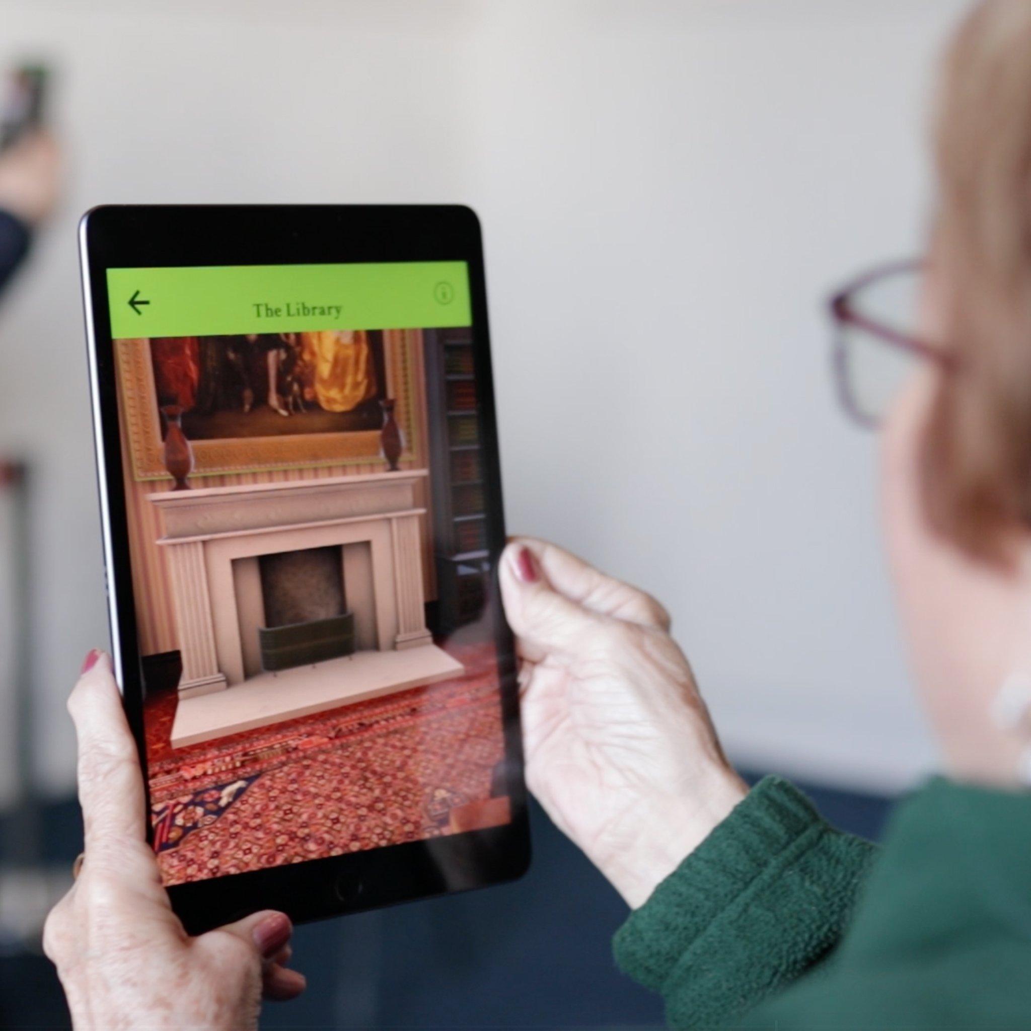 Margam Castle volunteer using M[AR]gam app on a tablet