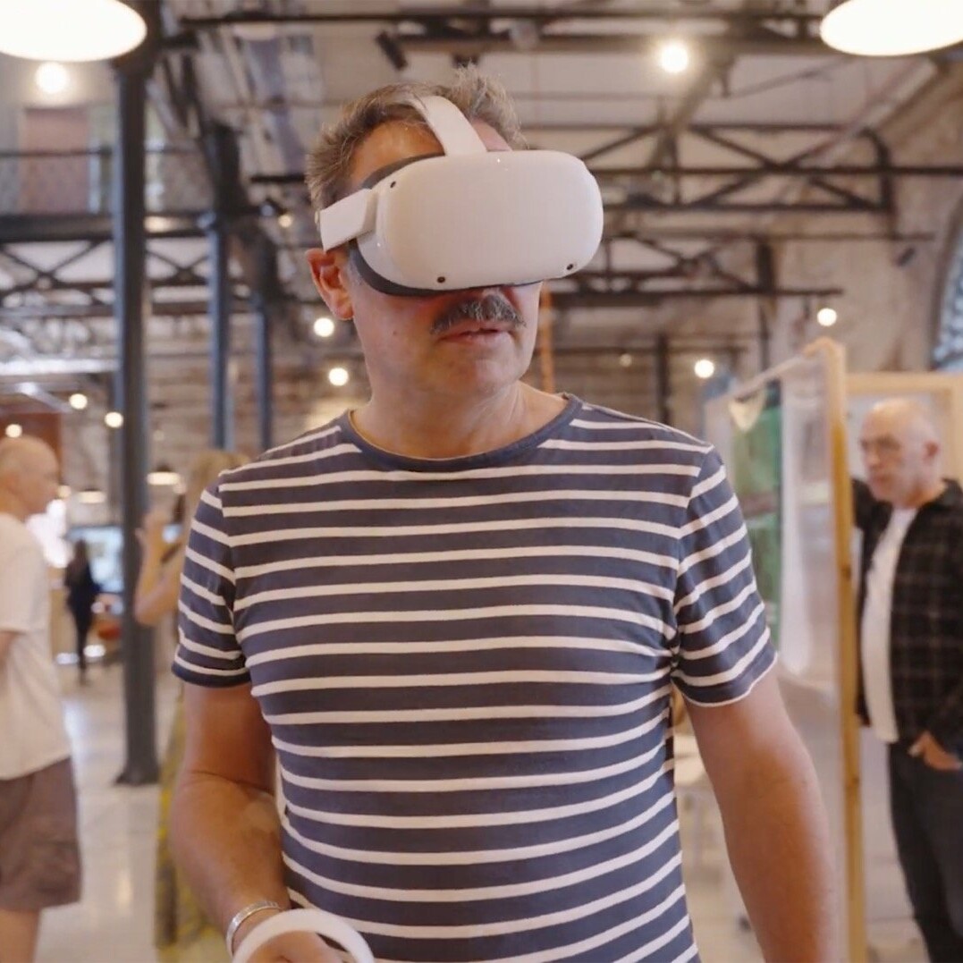 Man with VR (virtual reality) headset in the launch event of Bill's Attic VR and dome experience in memory of the artist Bill Mitchell