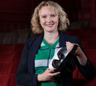 Catherine from Limina immersive VR researcher. with a virtual reality headset. Encounters film festival, immersive virtual reality cinema