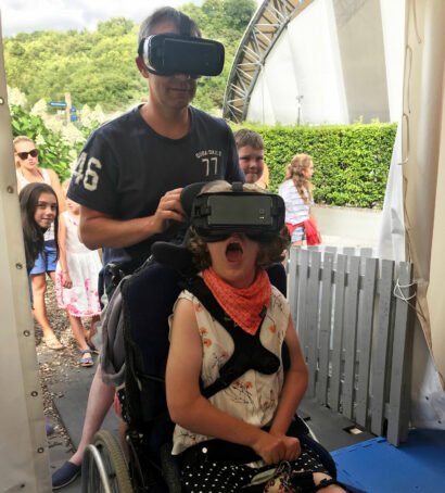 Wheelchair user VR Venus exploration at Eden Project