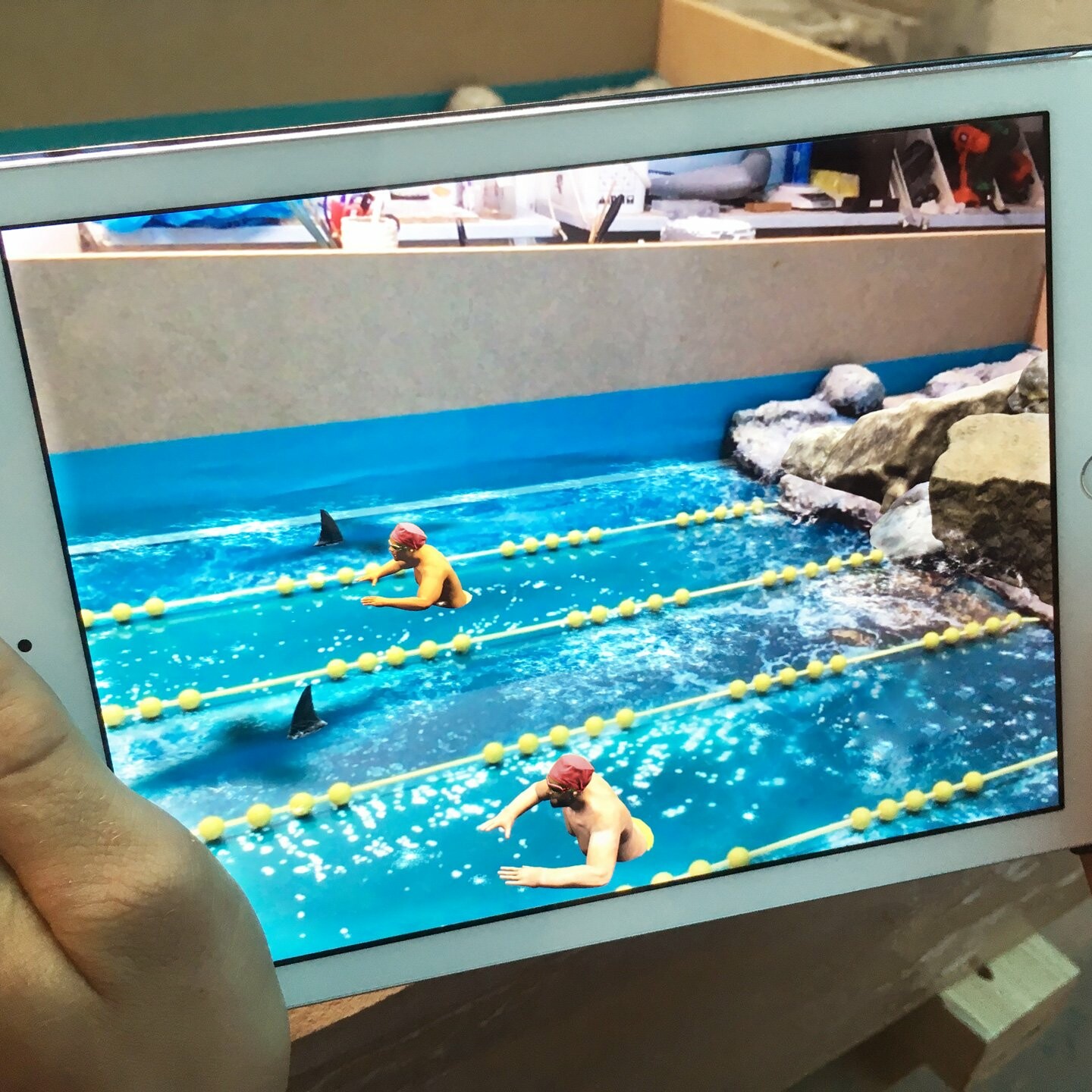 Marketing show. Augmented reality app in swimming pool model