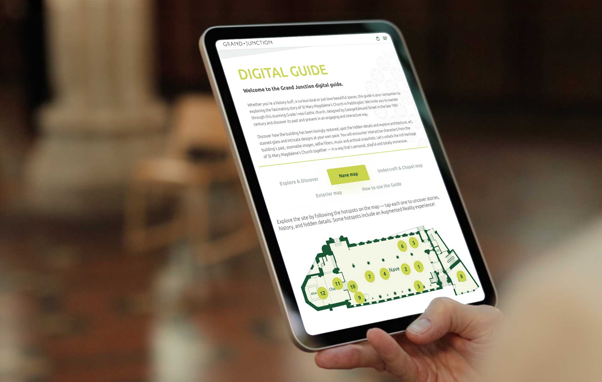Grand Junction Digital Guide on a tablet showing interactive map with hotspots links