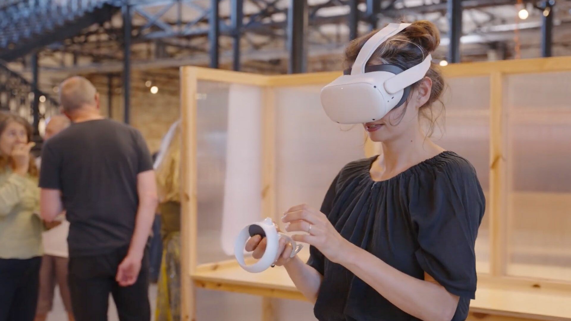 Woman with a VR headset on the Bills attic launch event