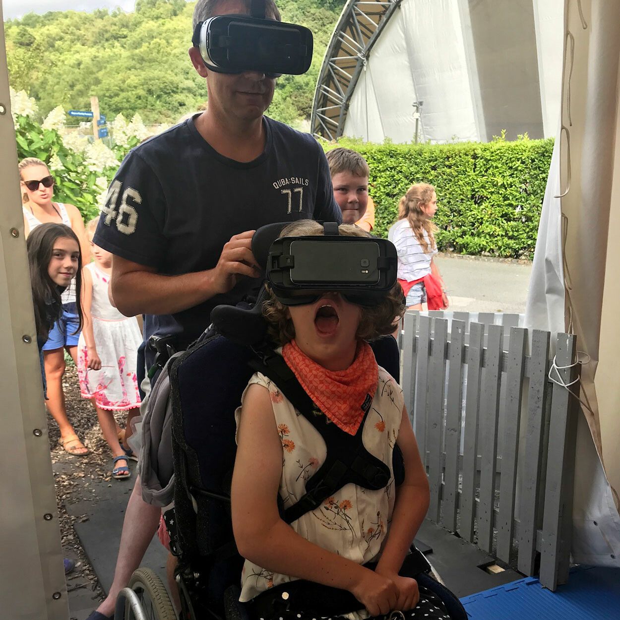 Wheelchair user using VR experience at Eden Project